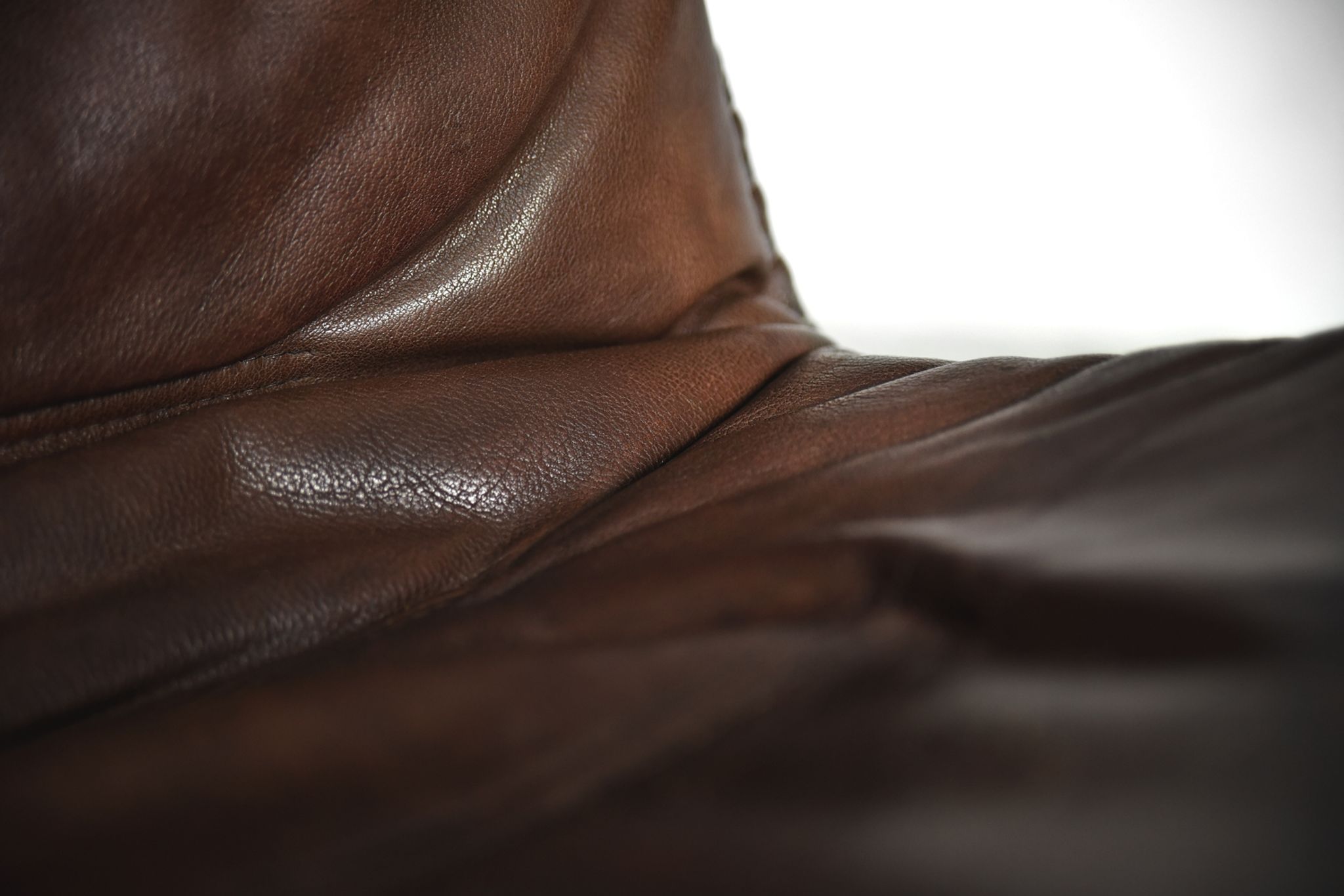 Danish patinated leather adjustable easy chair and ottoman by Berg Furniture, 1970s