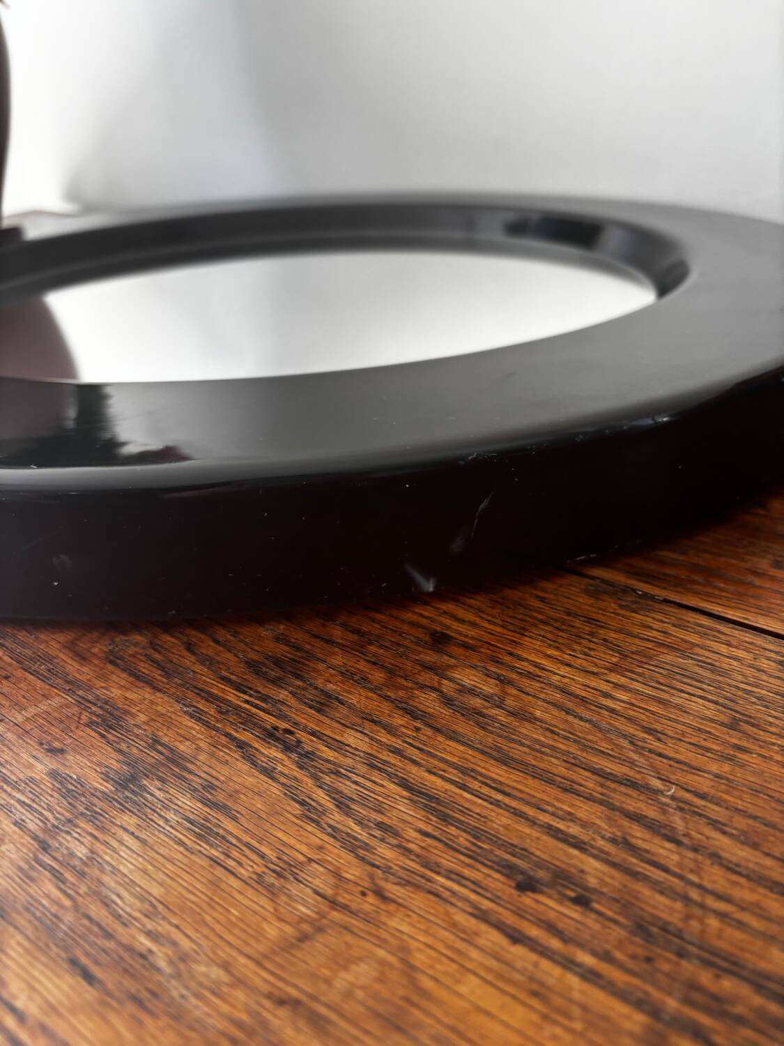 Vintage round mirror from the 70s, smoked brown plastic