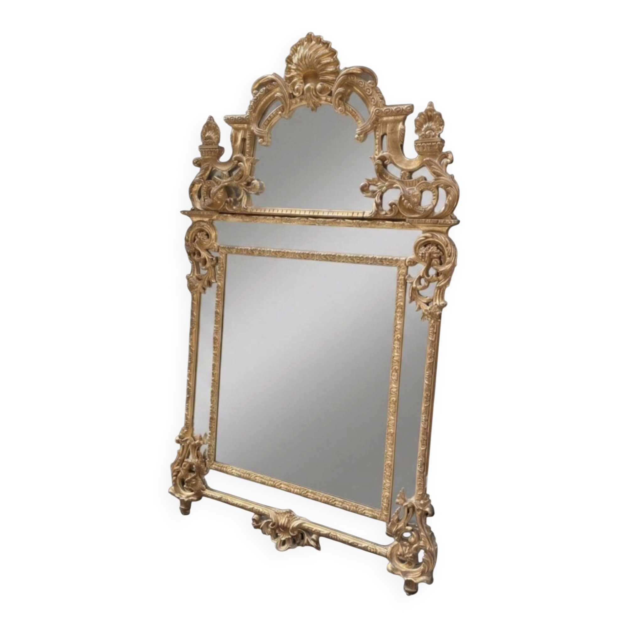 Regency style mirror in gilded wood, first half of the 19th century.