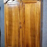 Exceptional Empire period wardrobe in solid walnut, 19th century, circa 1800