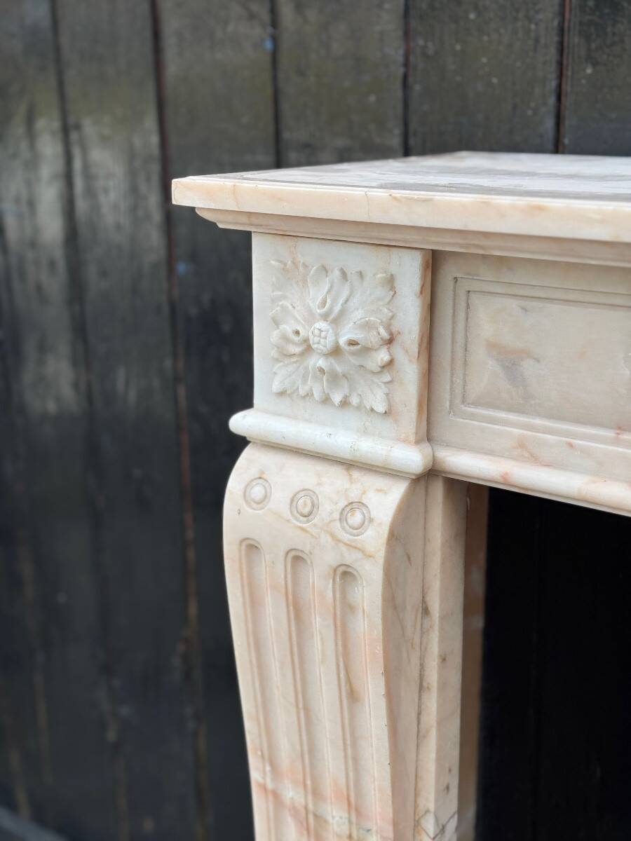 Louis XVI style fireplace in pink marble, circa 1920