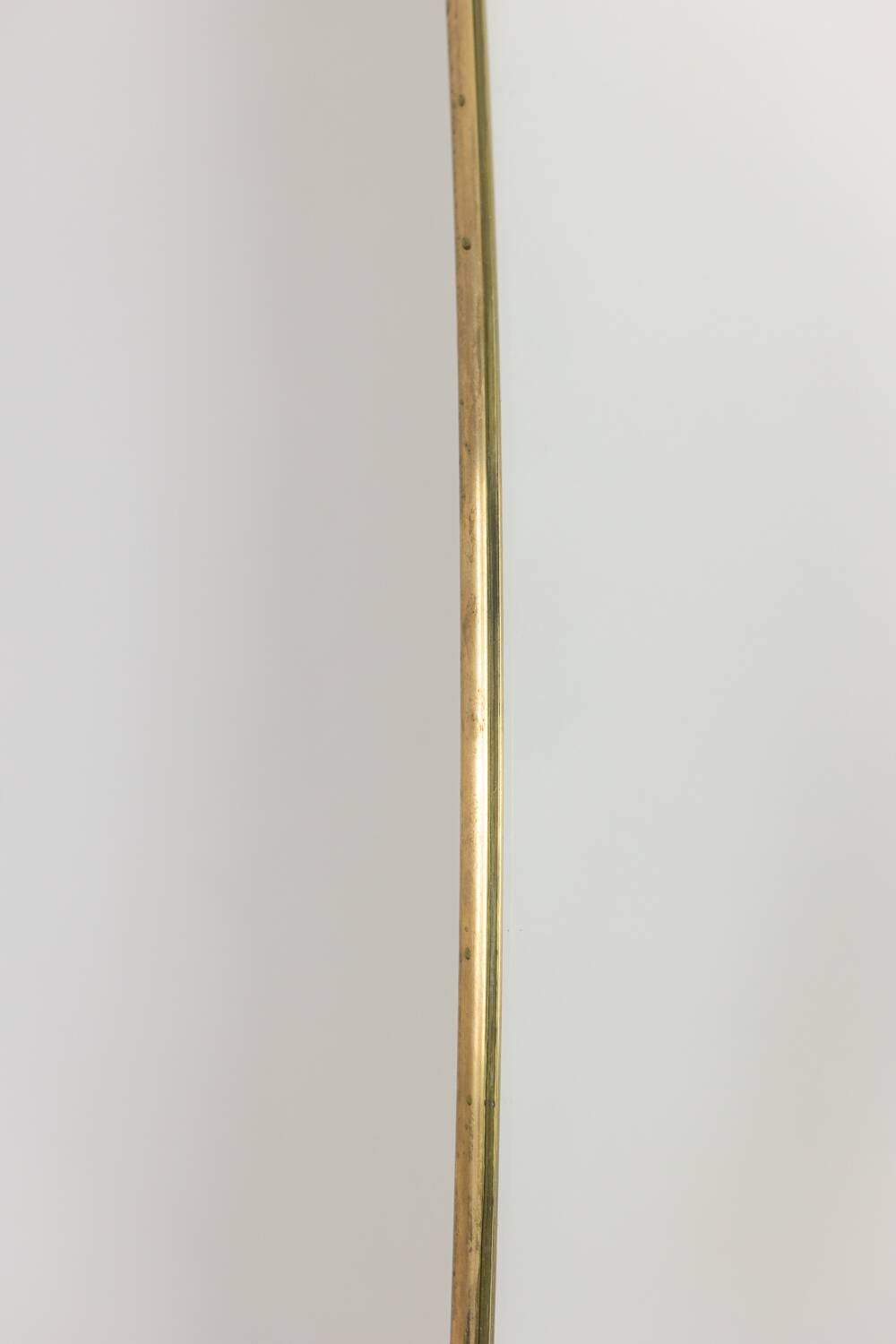 Mirror with a gilded brass frame. 1980s.