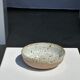 Speckled ceramic bowl and matte brown