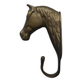 antique brass coat hook with horse head, vintage decor.