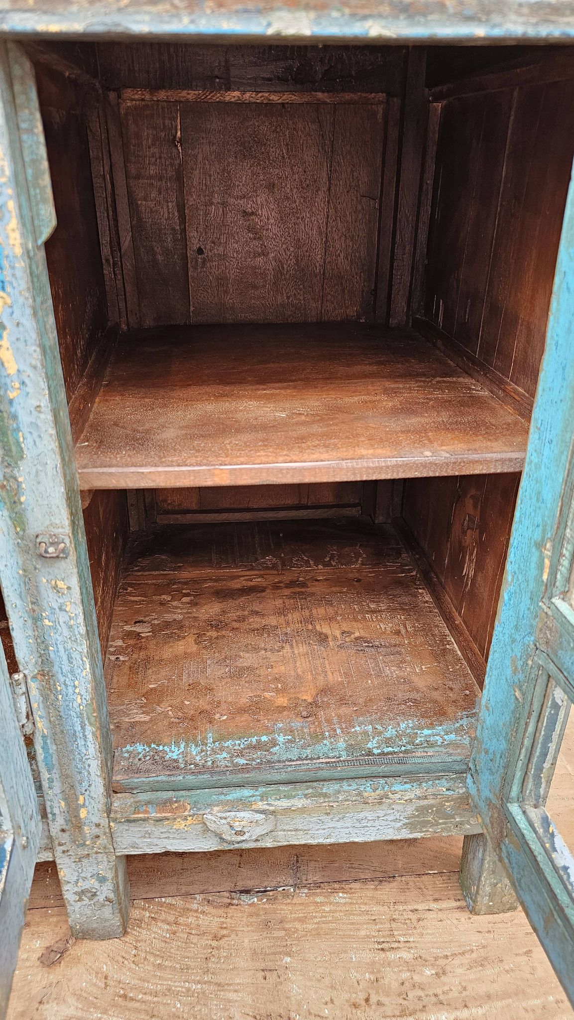 Antique glass-fronted buffet in Burmese teak