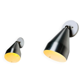 Paire de lampes murales réglables R155 en métal par Raak Amsterdam, Pays-Bas, années 1960.