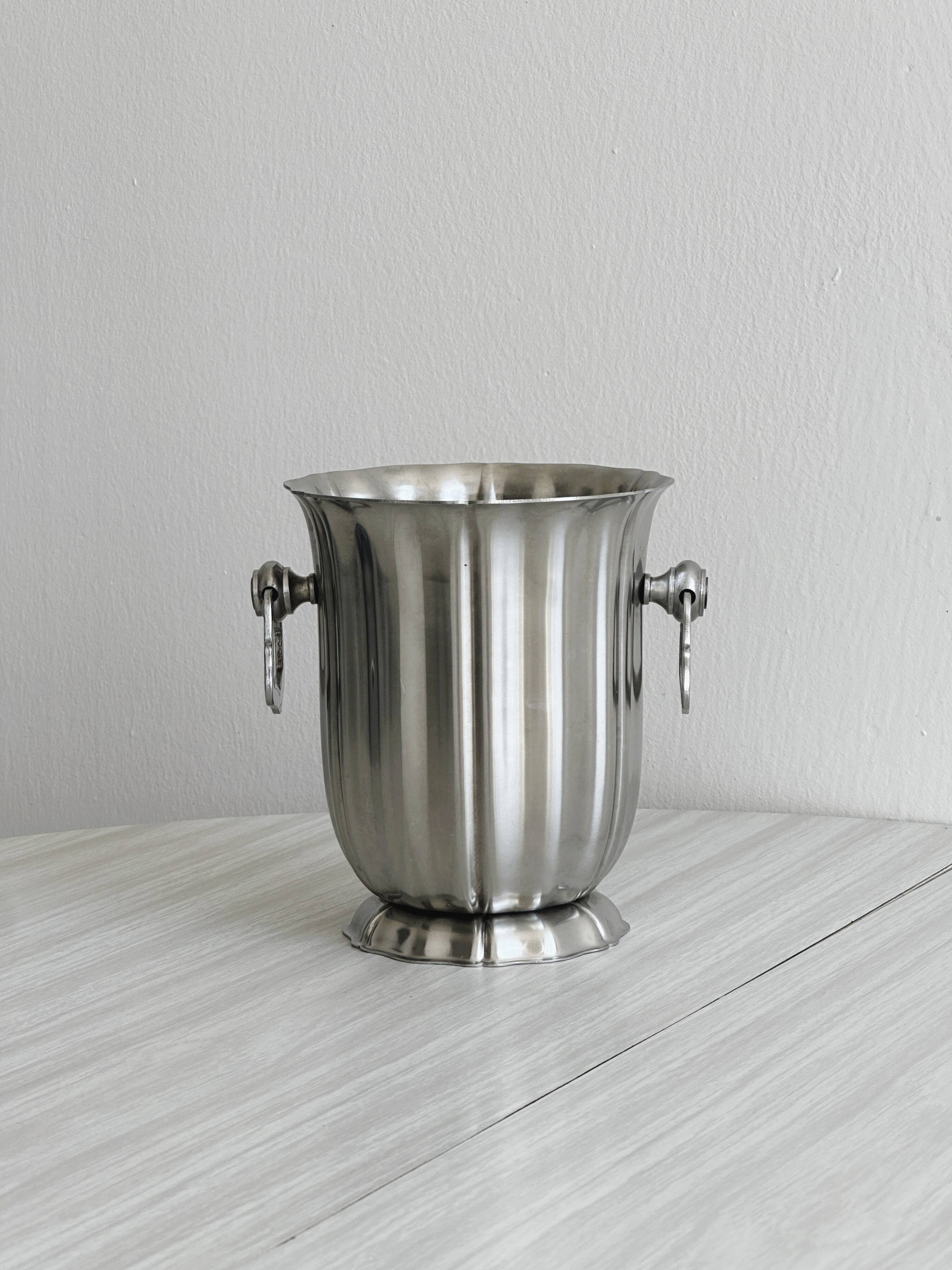 Small shiny stainless steel ice bucket