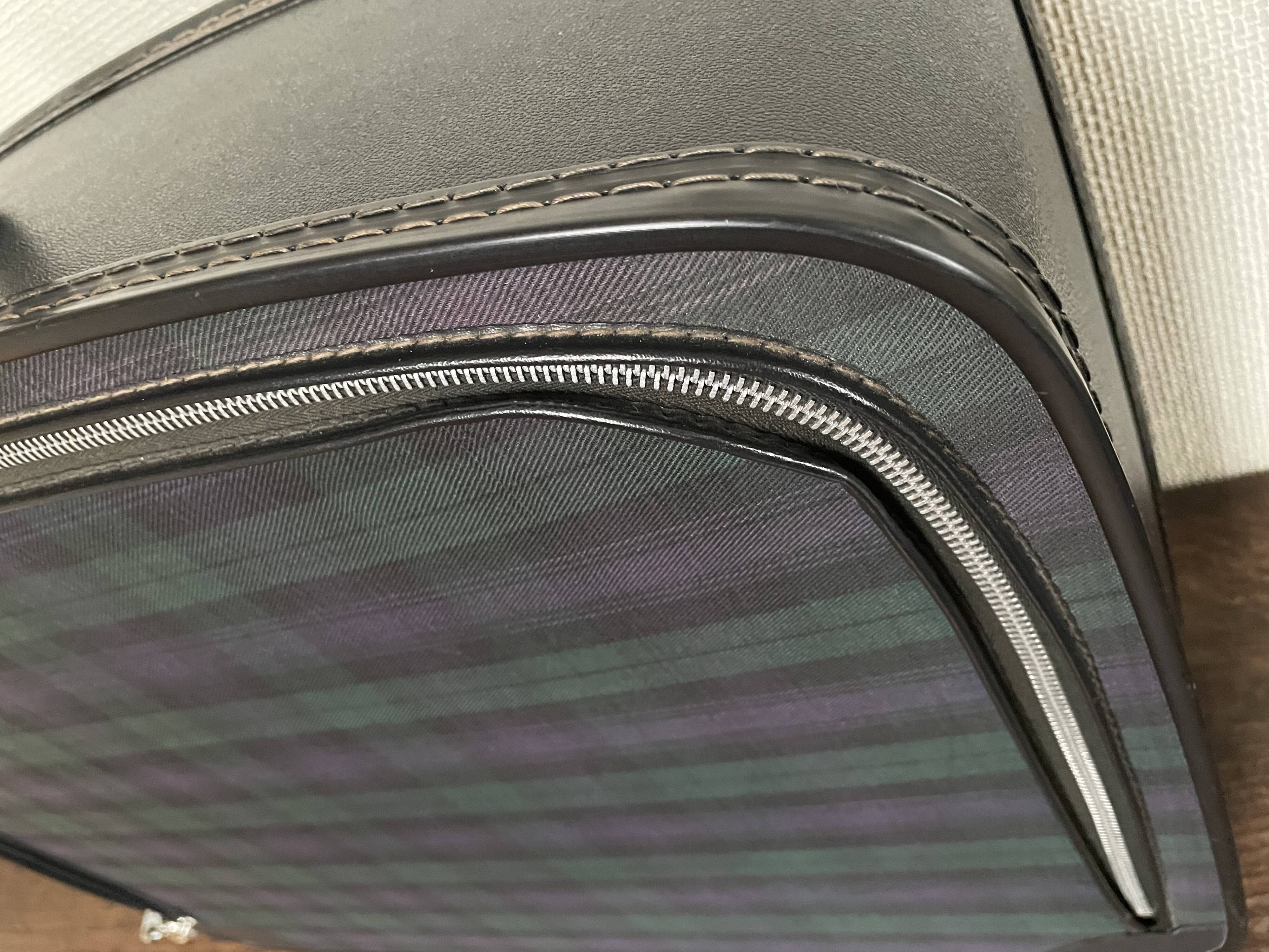 Tartan check suitcase