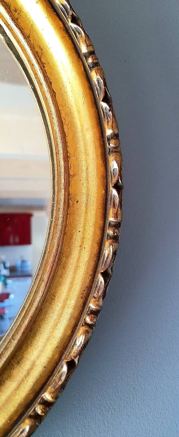 Round golden mirror, 1970.
