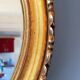 Round golden mirror, 1970.