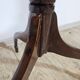Antique octagonal mahogany side table on a classic tripod, 19th century.