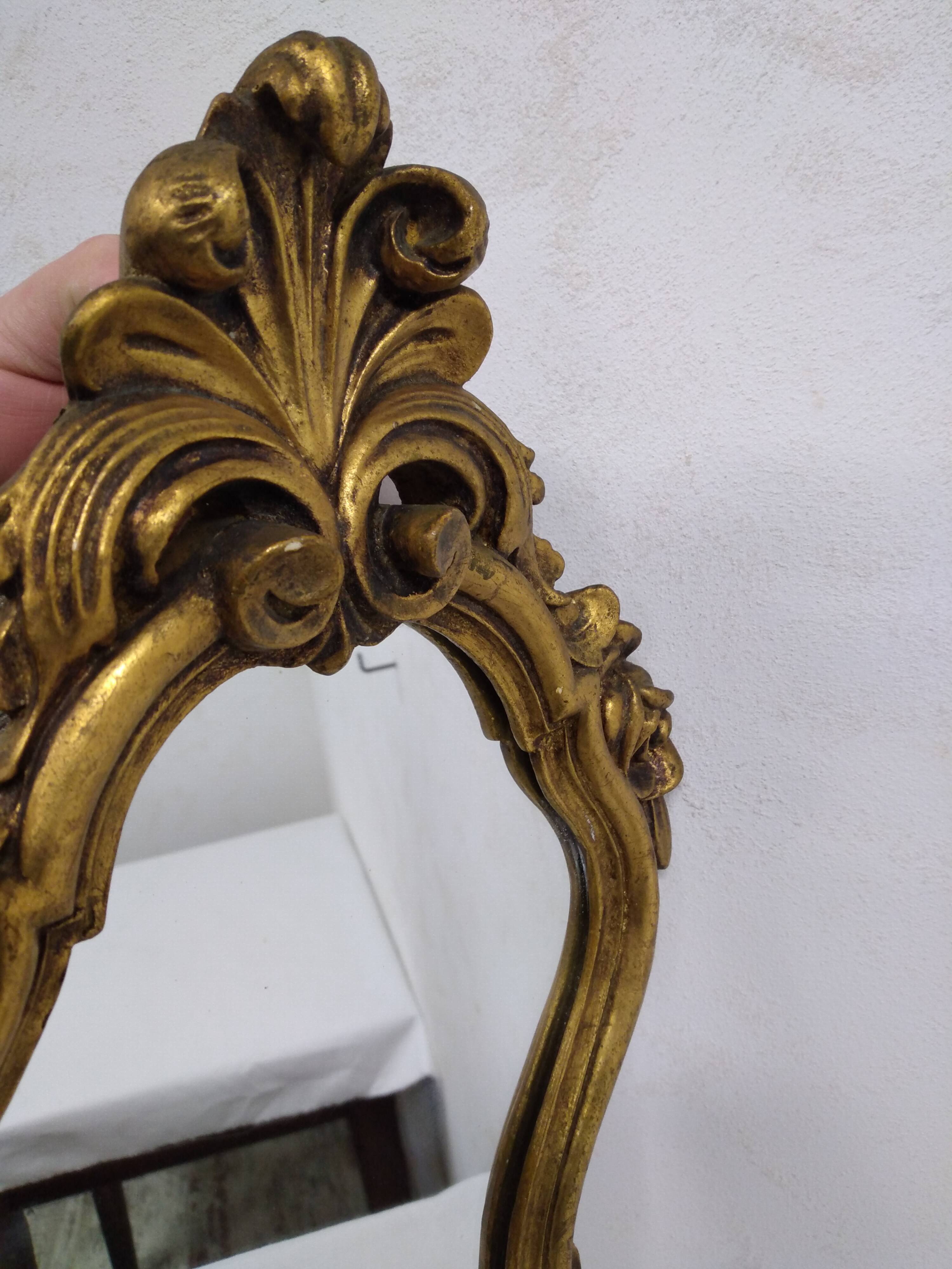 Gold stucco rocaille style mirror