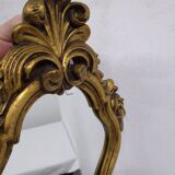 Miroir style rocaille en stuc doré