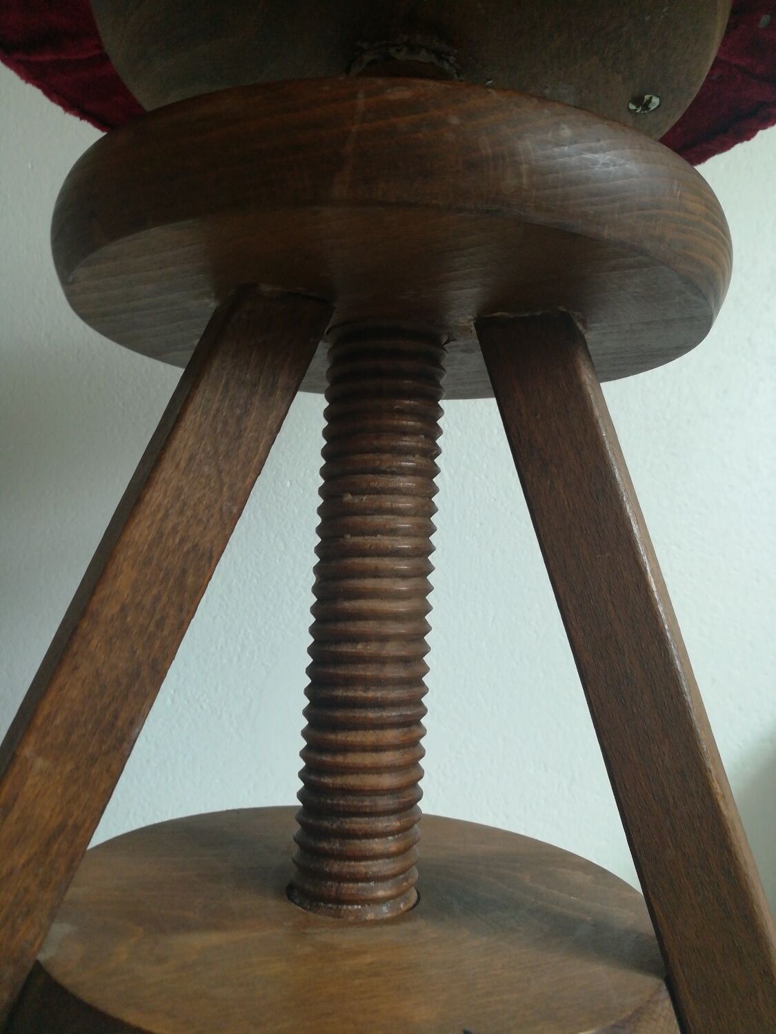 Old piano stool with screw