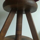 Old piano stool with screw