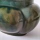 Art Deco flared cache-pot in turquoise glazed earthenware.