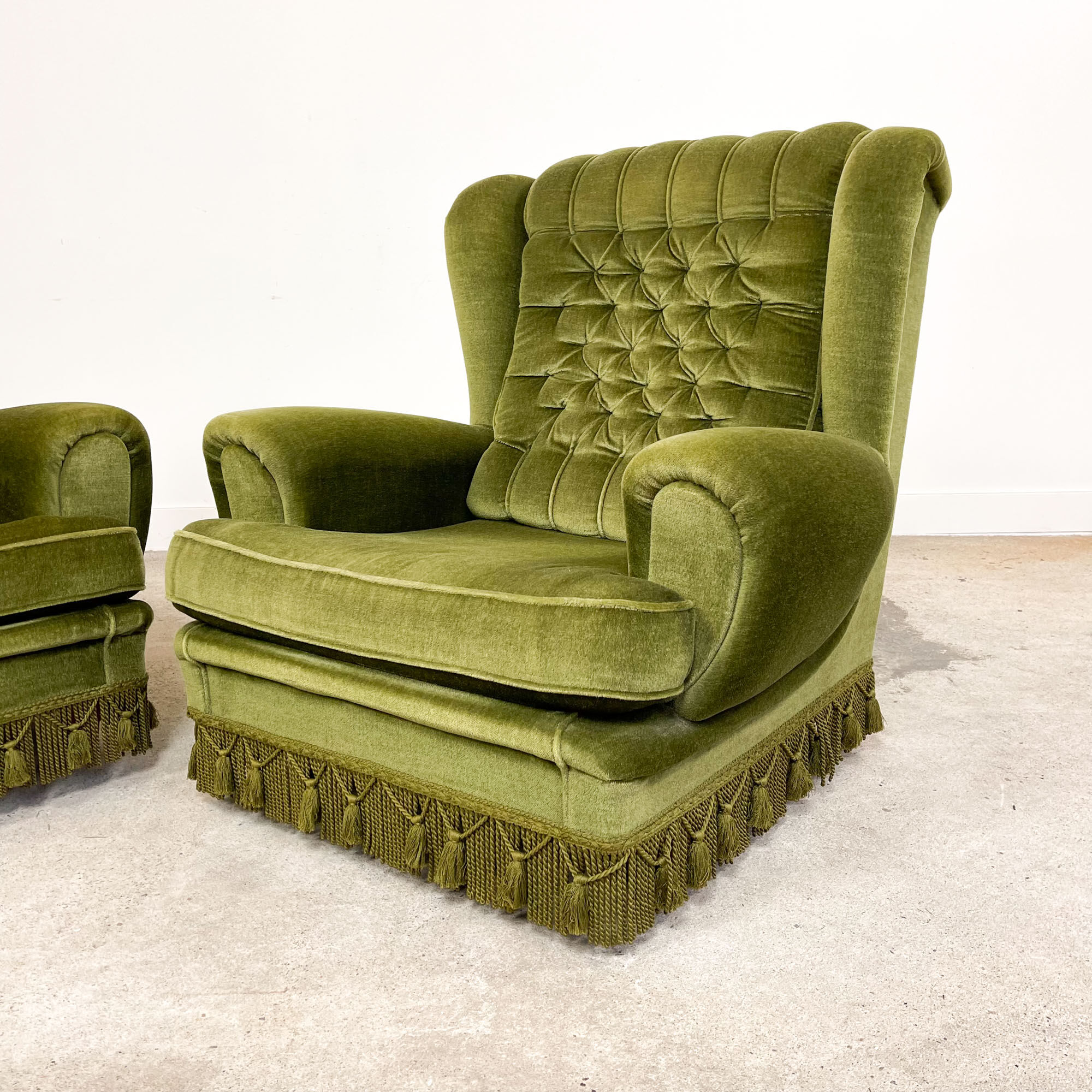Set of two vintage original green velvet armchairs