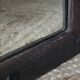 Old handcrafted Gothic style wooden mirror