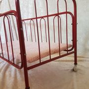 Vintage doll bed large model in red lacquered metal and matching mattress