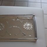 Glass top with coplès patterns. Metal surround.