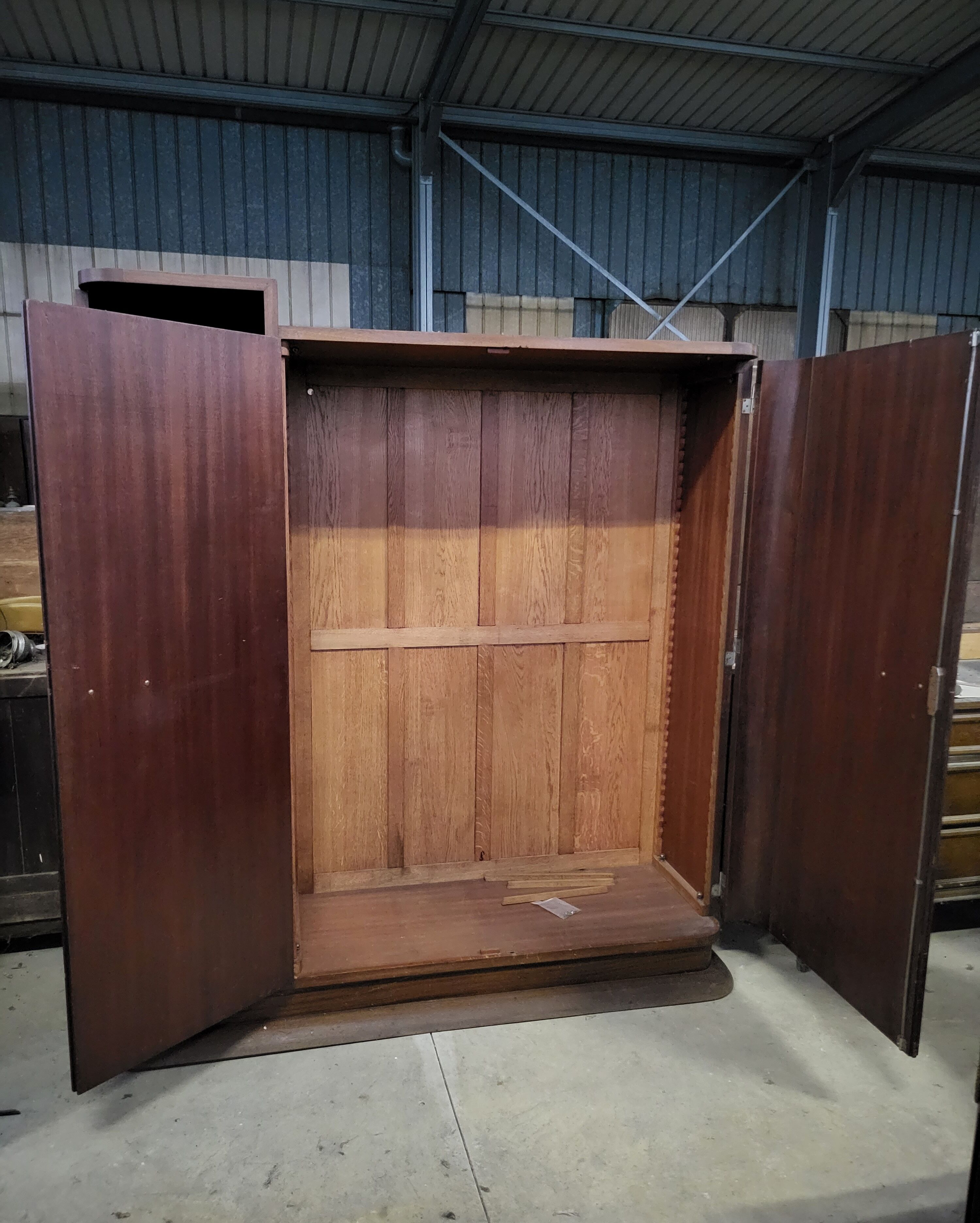 Asymmetrical art deco rosewood veneer cabinet