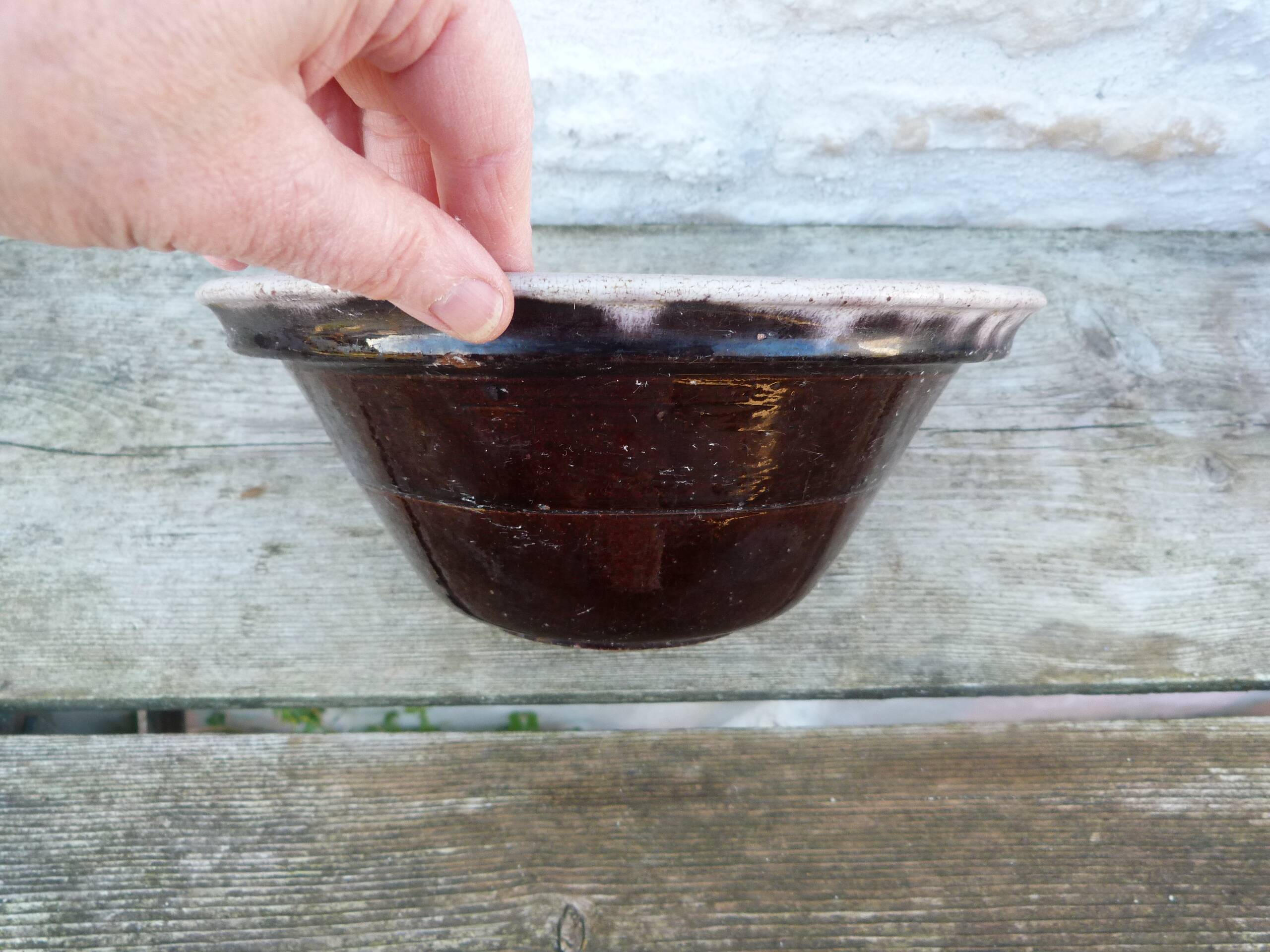 Large hollow salad bowl in glazed earthenware on the inside