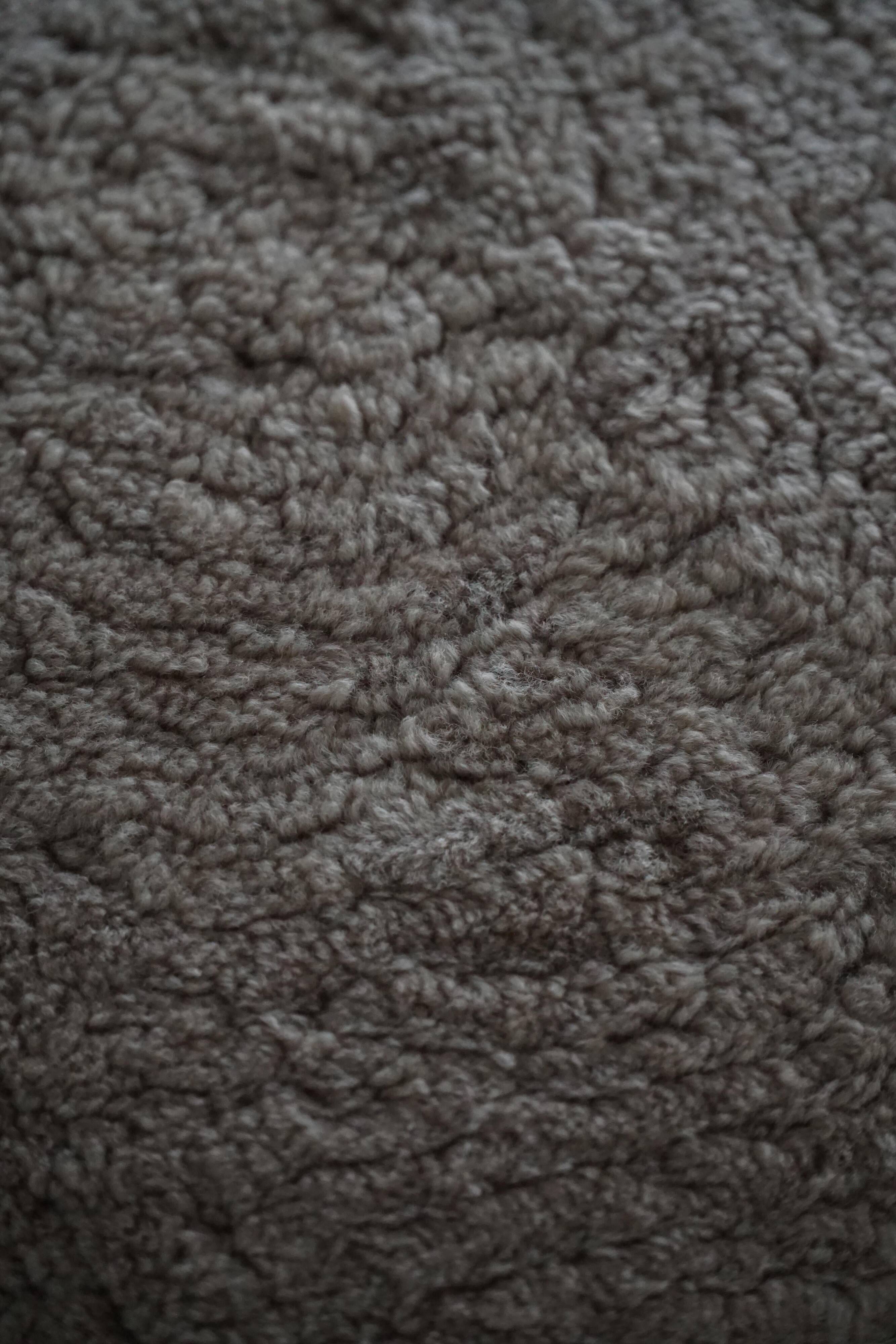 A pair of antique Danish stools, seats in lambswool, late 19th century.