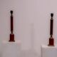 Set of French Empire style lamps made from amber bakelite and brass