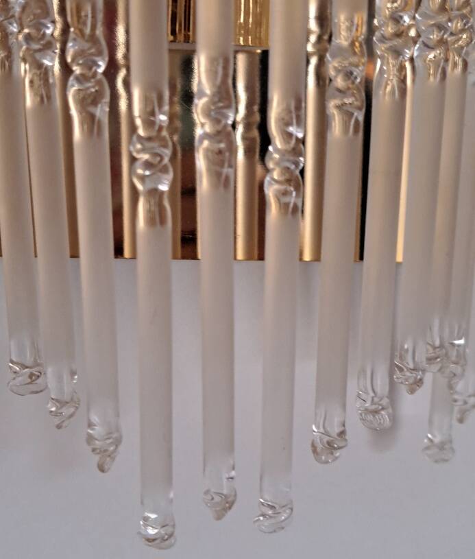 Pair of gold metal wall lights with tassels