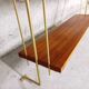 Vintage wall shelf in teak and golden brass String Tomado style