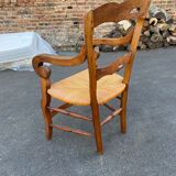 Walnut and straw armchair