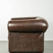 Set of a smooth chesterfield sofa and armchair with a timeless English look