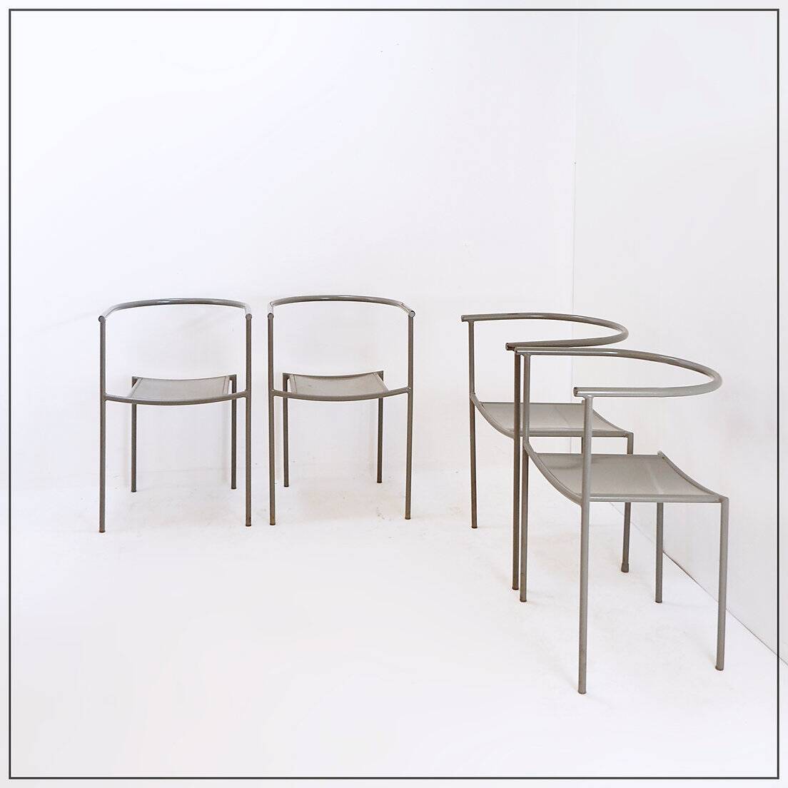 Set of 4 gray metal chairs in the style of Starck's "Von Vogelsans" model