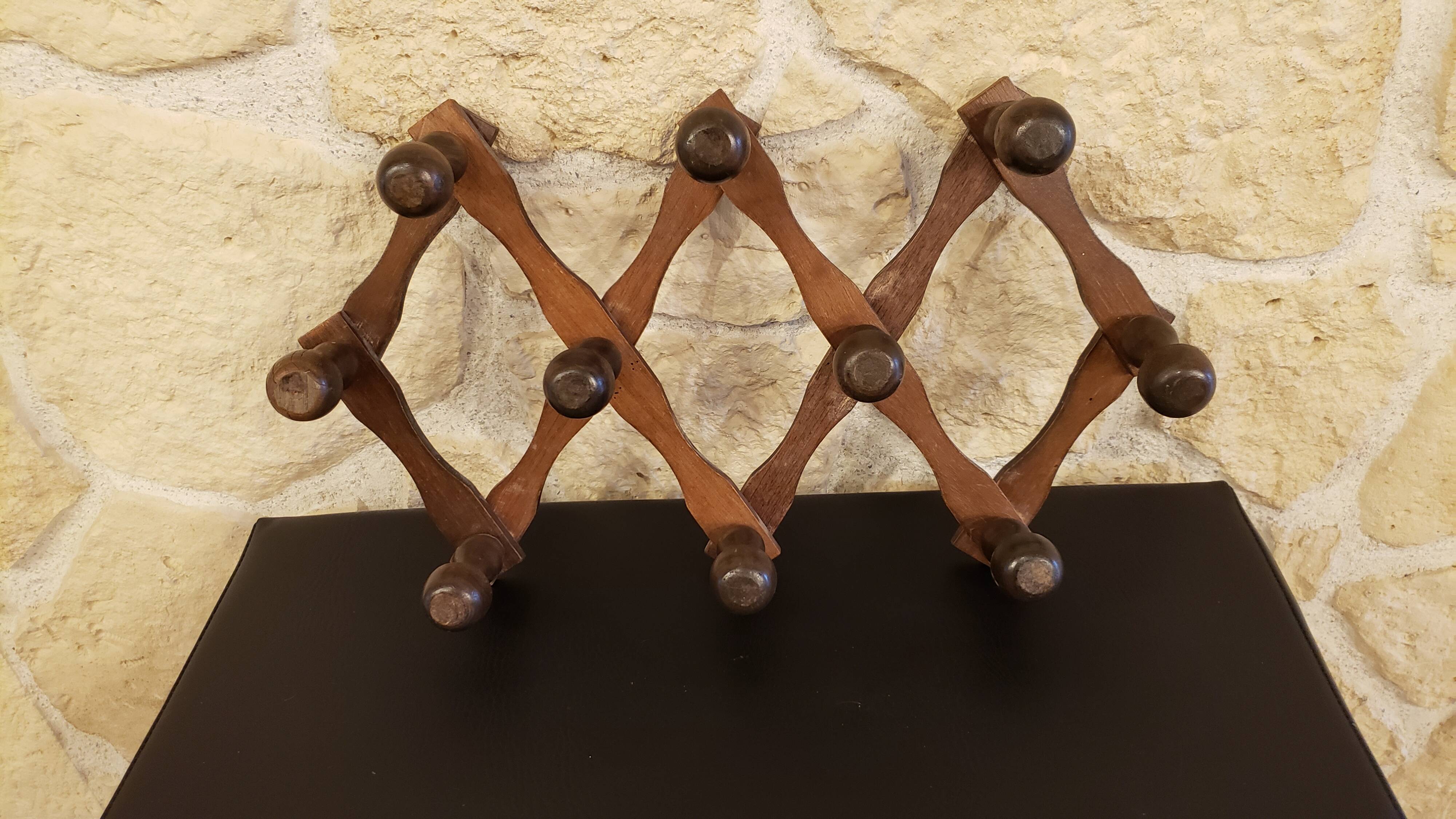 Extendable wooden coat rack with 10 old vintage hooks