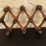 Extendable wooden coat rack with 10 old vintage hooks