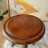 Old farm stool, wooden tripod campaign
