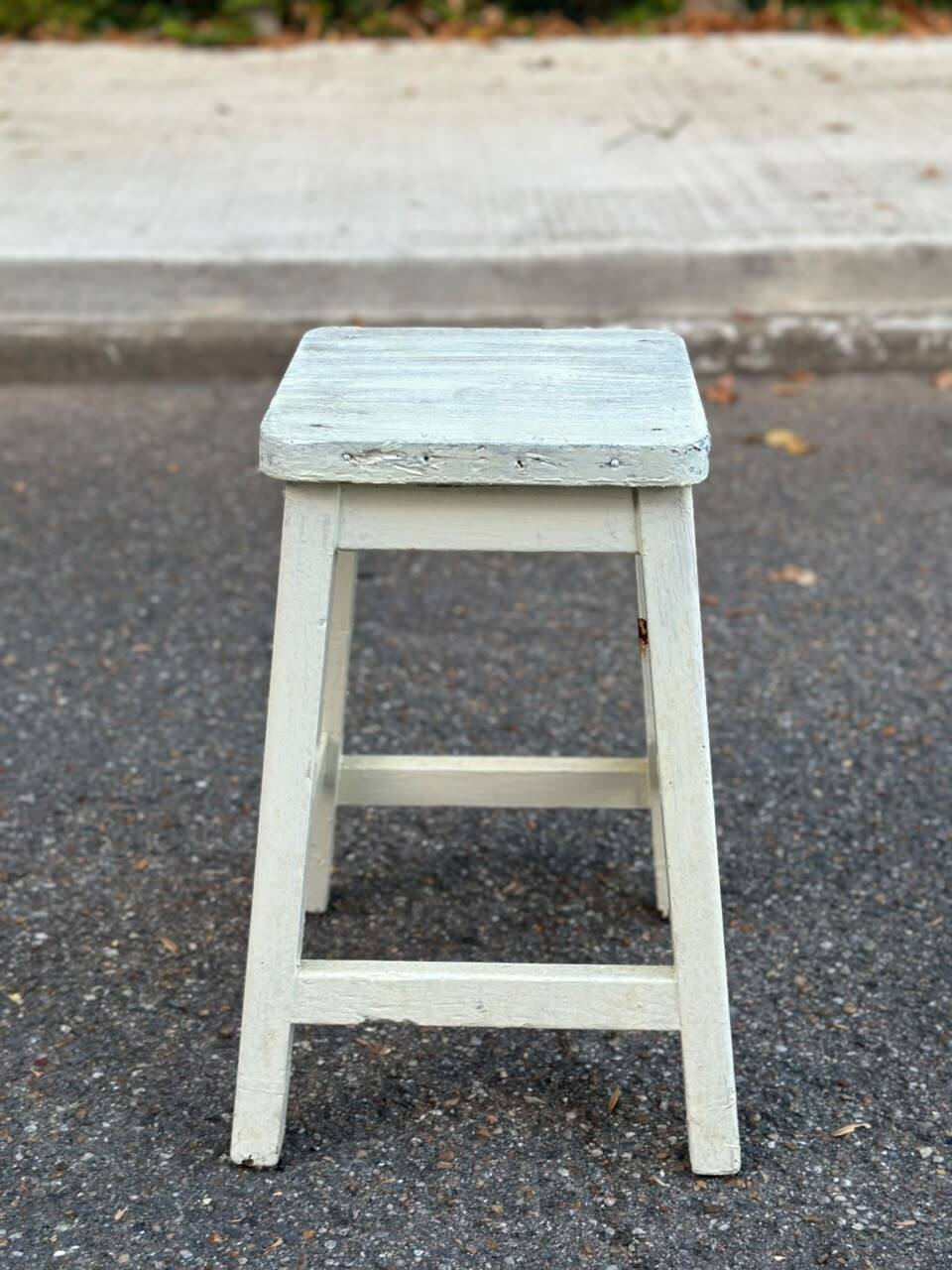 Rustic square farmhouse stool in patinated white wood from the 1960s.