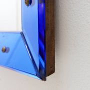 Mirror with coloured glass frame, Italy, circa 1950.