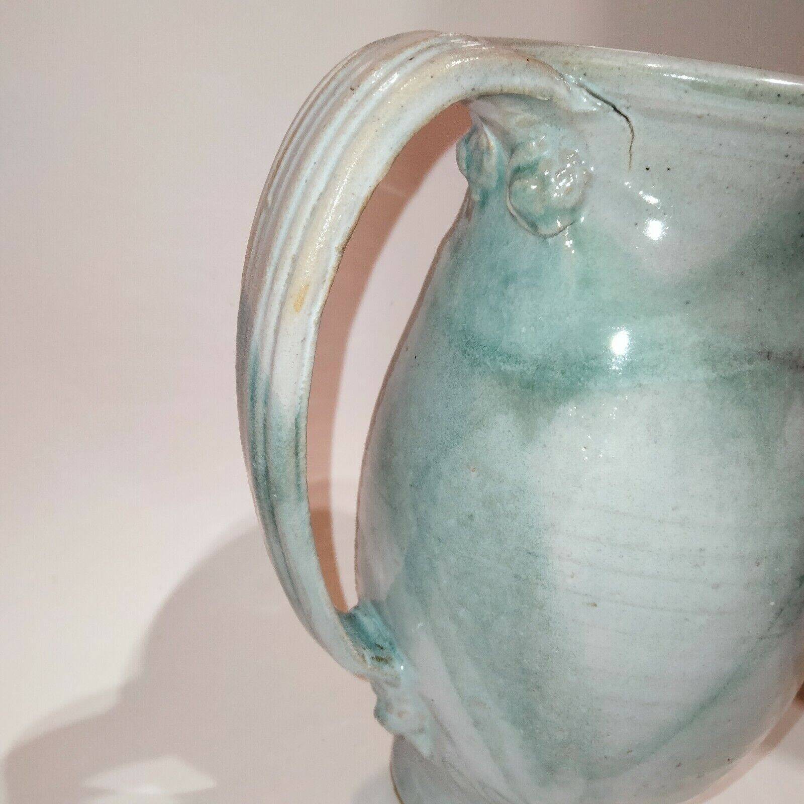 Red and grey glazed stoneware pitcher Signed Height 21 cm