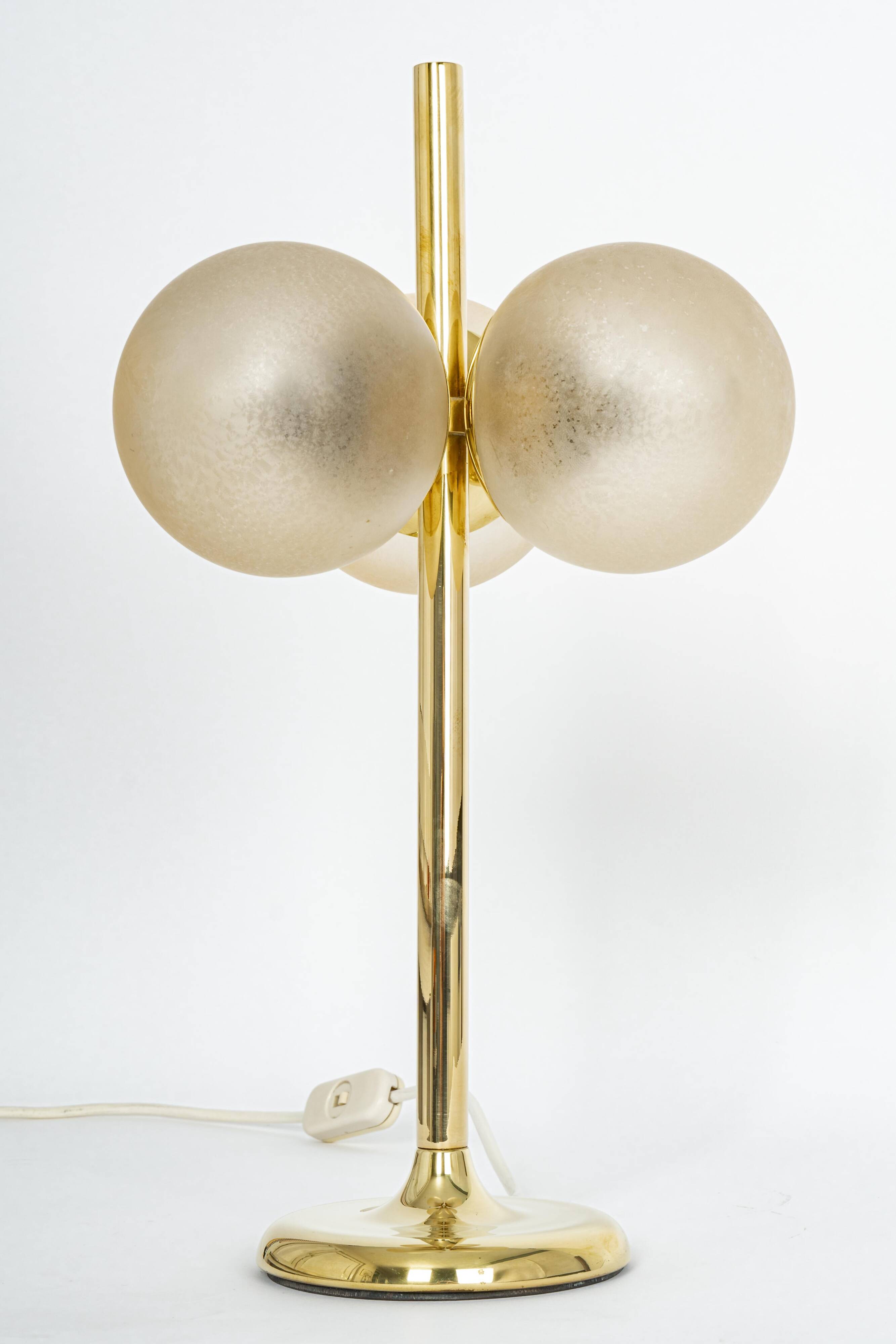 Pair of large brass table lamps by Kaiser, Germany, 1970s.