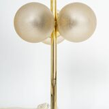 Pair of large brass table lamps by Kaiser, Germany, 1970s.