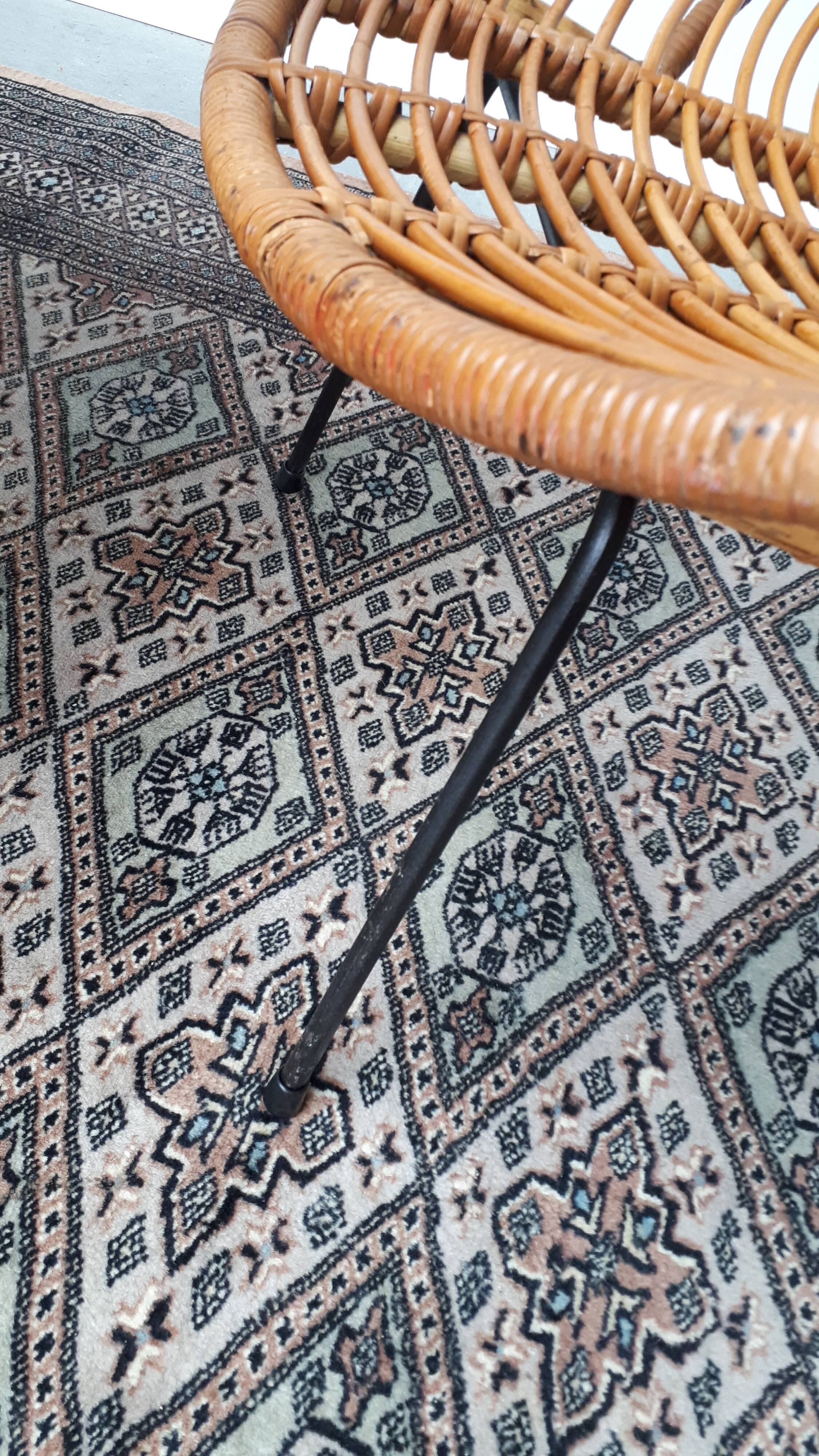 Set of armchairs "soleil" and rattan table of the years 50