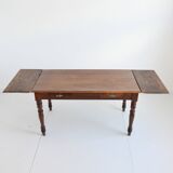 Farm table with extensions from the early 20th century.