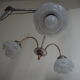 Suspension with 3 brass lights and a white glass globe from the 1950s-1960s.