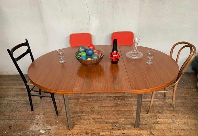 Round table with teak extension design Pierre Guariche edition Huchers Minvielle 1960