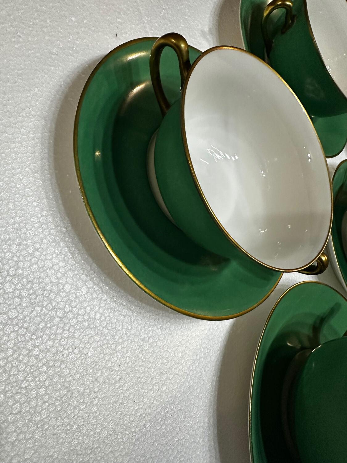 Service 14 cup and saucer in Art Deco Emerald Green and Gold.