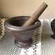 Cast iron mortar and wooden pestle