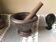 Cast iron mortar and wooden pestle