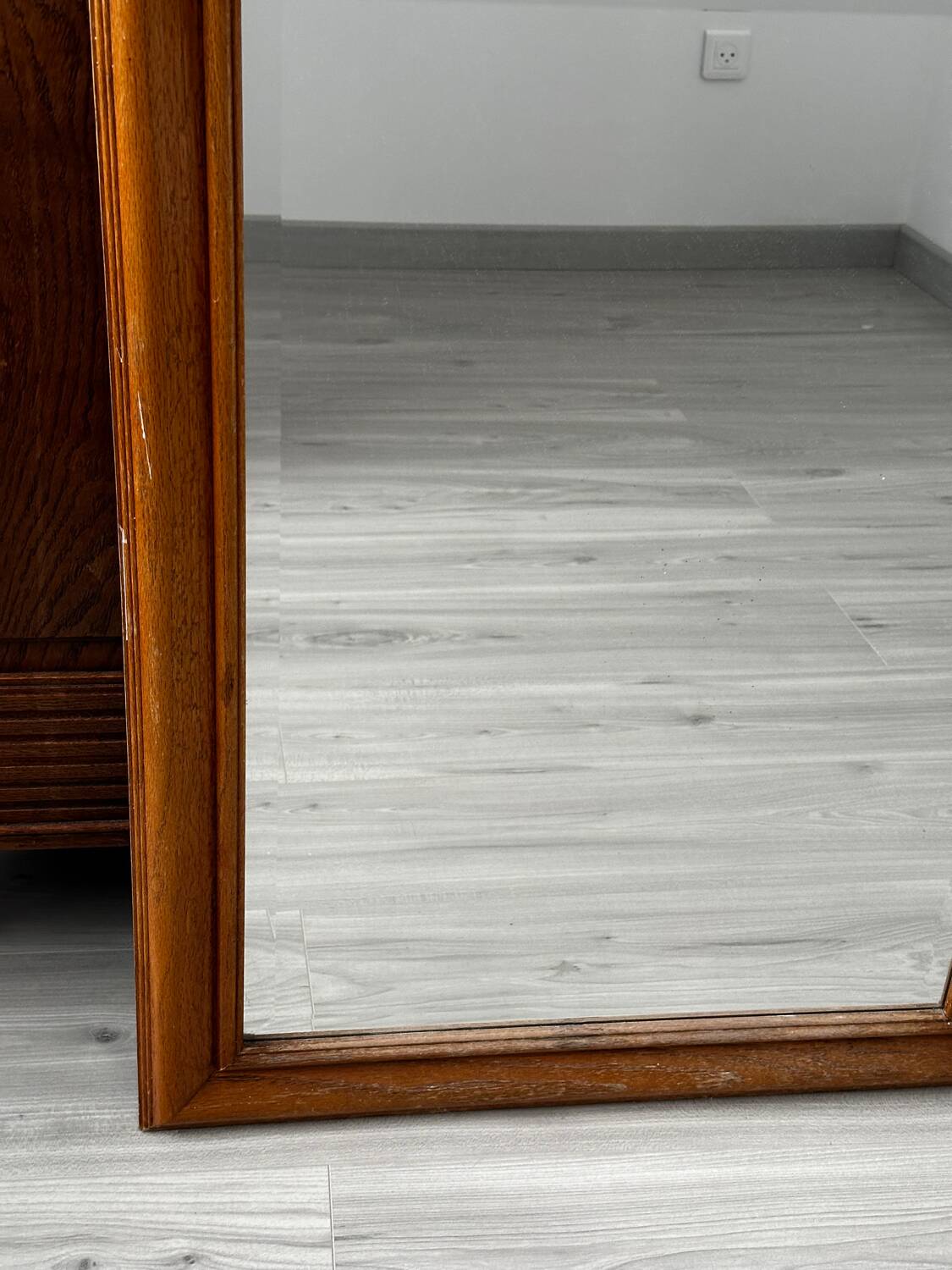 Rectangular light wood mirror from the 1950s with bevelled glass, 83/62 cm.