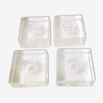 Series of 4 pressed glass ice candle holders